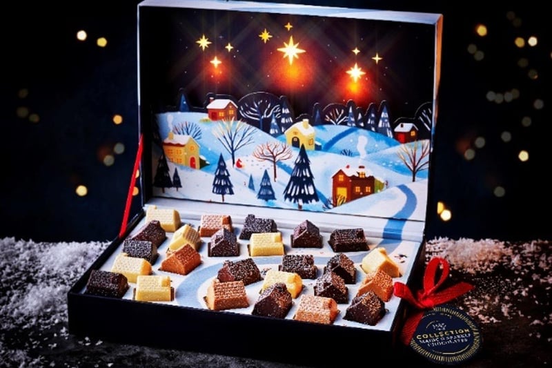 Magic & Sparkle Chocolates – the FIRST EVER light-up chocolate box - 345g - £20
Lift the lid on these delicious mini snow-dusted milk, dark, white and golden blond chocolate houses and watch the stars inside the box twinkle in a dazzling festive scene.