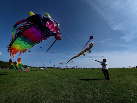 Sarah Bindon flies her kite into the blue sky. (JPI Media/ Richard Ponter)