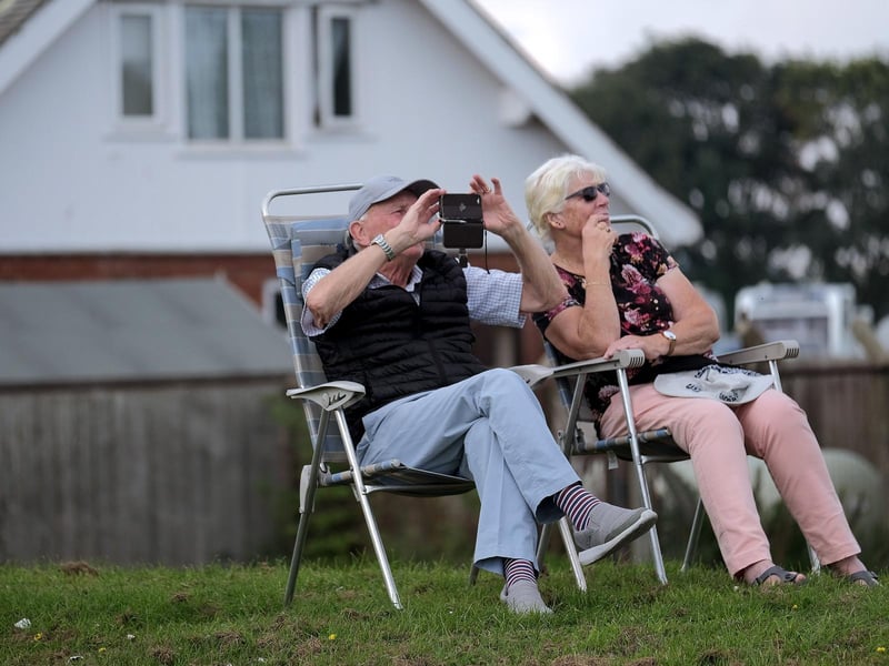 A couple enjoy the spectacle.