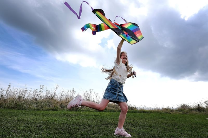 Ella Davies launches her kite.