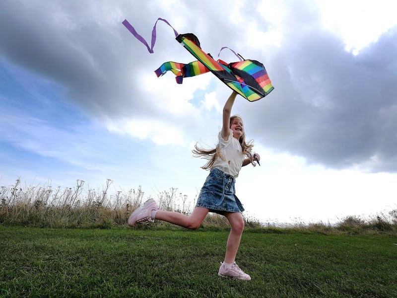 Ella Davies launches her kite.
