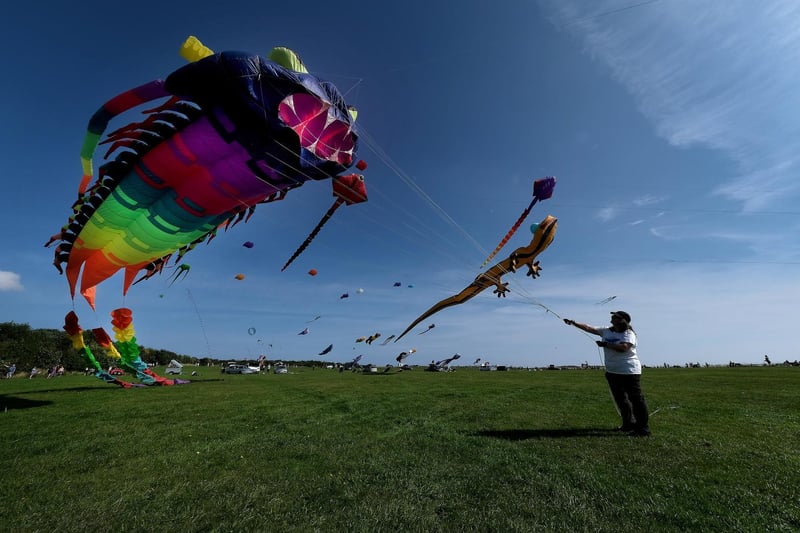 Sarah Bindon flies her kite into the blue sky.