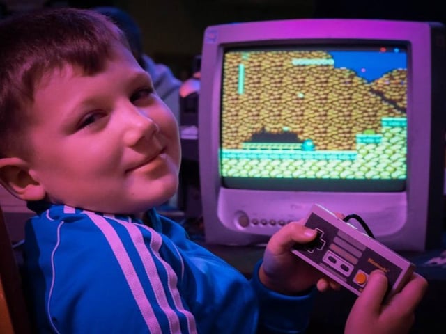 Cory Southern playing on the Nintendo Entertainment System (NES)