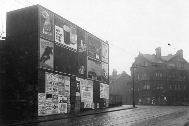 February 1930 and at the top of Victoria Road on the left are posters covering the whole side of a building. They include those for Hyde Park Picture House, Lyceum Picture House at Cardigan Road, Lounge Cinema at Headingley.