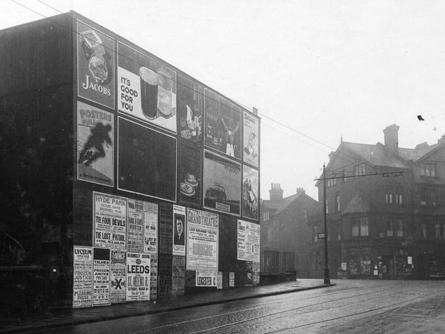 February 1930 and at the top of Victoria Road on the left are posters covering the whole side of a building. They include those for Hyde Park Picture House, Lyceum Picture House at Cardigan Road, Lounge Cinema at Headingley.