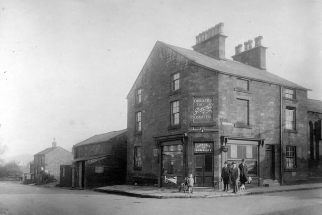 Weetwood Lane (left) at the junction with Moor Road pictured in October 1930. The shop on the corner was previously 'The Flower Box'.