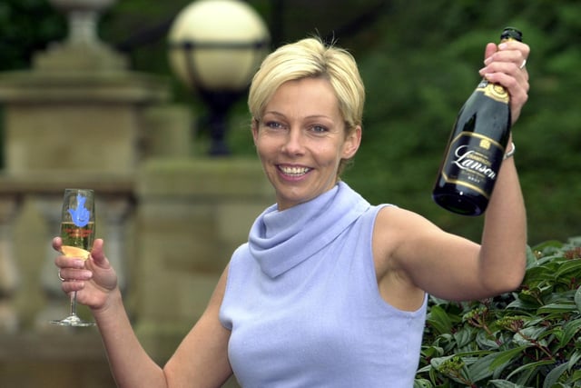 This is Nicola Otterburn who was celebrating after scooping £2.2 million on the National Lottery. She is Oulton Hall Hotel in Leeds.