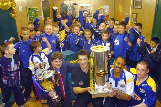 Harehills Pigeons RL's new changing rooms at Harehills Liberal Club were officially opened. Pictured is  Andrew Wilson the Rugby League development officer for Leeds, seen holding the Super League trophy. Also pictured are team coaches, from left, Andy Batt, Errol Wyatt and Brian Carr.
