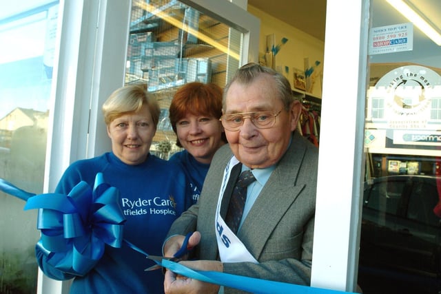 John Andrews cuts the tape to open the new Sue Ryder Care Store on Austhorpe Road in Cross Gates. He is pictured with joint shop managers Ann-Marie Brook and Christine Cockrem.