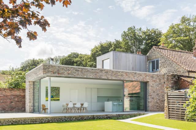 The contemporary extension that lays behind the historic former school house