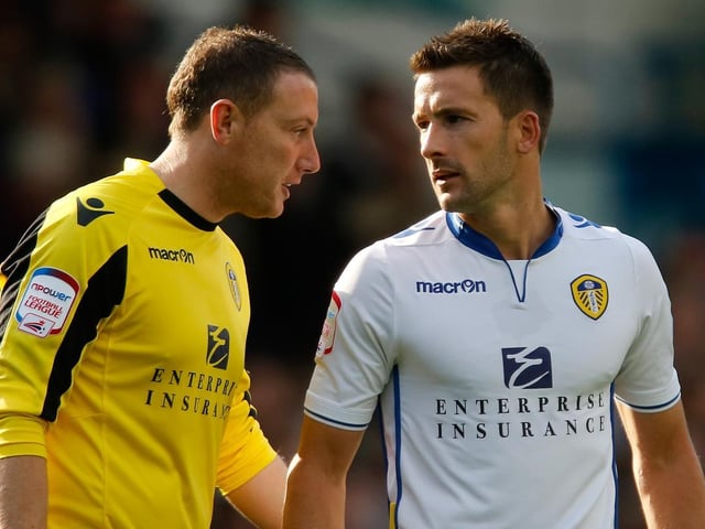 Paddy Kenny talk with teammate Adam Drury during the Championship clash against Nottingham Forest at Elland Road in September 2012.