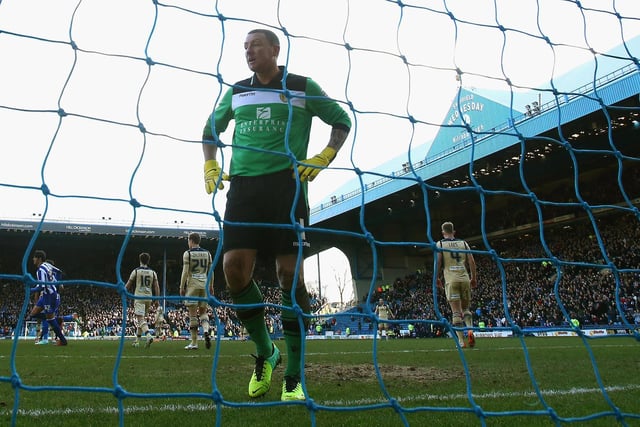 Paddy Kenny is left dejected after conceding a goal during the Championship clash against Sheffield Wednesday at Hillsborough in January 2014.