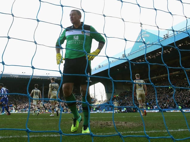 Paddy Kenny is left dejected after conceding a goal during the Championship clash against Sheffield Wednesday at Hillsborough in January 2014.