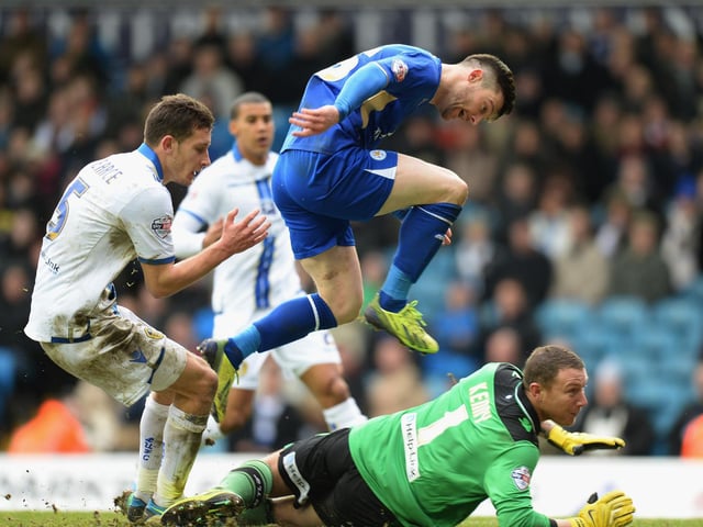 Leicester City striker David Nugent jumps over Paddy Kenny as he scores during the Championship clash at Elland Road in January 2014.