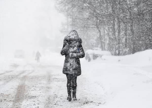 A woman makes her way through the snow on 1 March 2018 in Balloch, Scotland, during the Beast from the East. Picture: Jeff J Mitchell/Getty Images