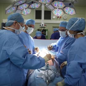 A surgeon and his theatre team perform key hole surgery at The Queen Elizabeth Hospital in Birmingham. Picture: Christopher Furlong/Getty Images