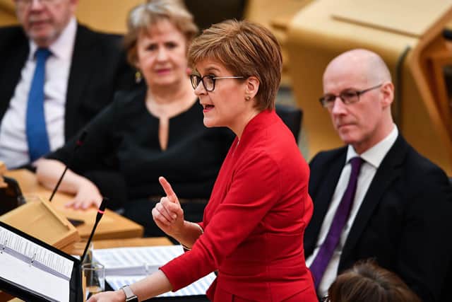 Nicola Sturgeon speaks in the Scottish Parliament as leading SNP politicians look on (Picture: Jeff J Mitchell/Getty Images)