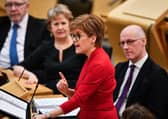 Nicola Sturgeon speaks in the Scottish Parliament as leading SNP politicians look on (Picture: Jeff J Mitchell/Getty Images)