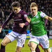 Hibs' Greg Docherty and Hearts defender Aaron Hickey (left) vie for possession during the Easter Road derby