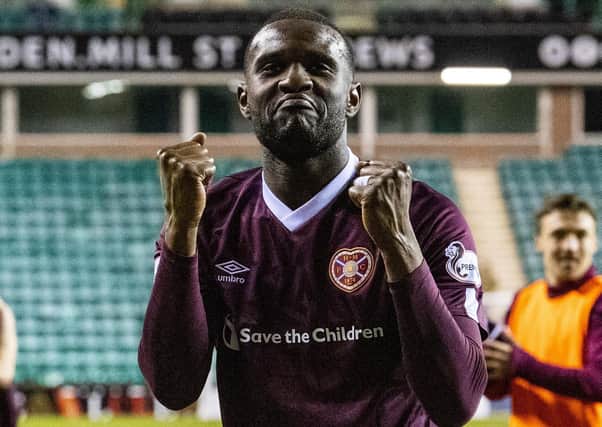 Clevid Dikamona salutes the Hearts fans after the 3-1 derby win at Easter Road on Tuesday. Picture: Ross Parker/SNS