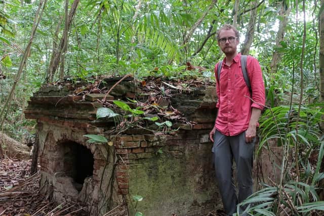 The rediscovered. tomb of Sir James Balfour. Slaves tended to his embalmed body after his death. Pictured is independent researcher Michael Hopcroft. PIC: Michael Hopcroft.
