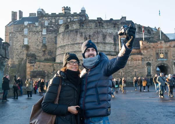Will the number of tourists travelling to Scotland to visit attractions such as Edinburgh Castle take a downturn? (Picture: Ian Georgeson)