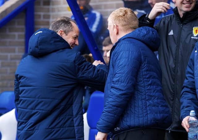 Elbow-bump: Livingston manager Gary Holt and St Johnstone’s Alec Cleland avoid shaking hands (Picture: Roddy Scott/SNS Group)
