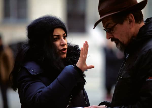 Iranian director Marjane Satrapi on the set of Radioactive