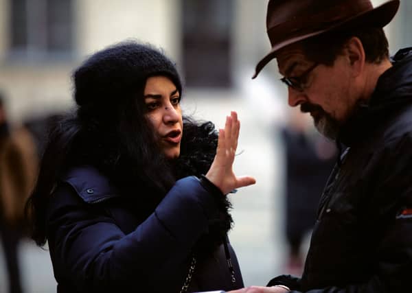 Iranian director Marjane Satrapi on the set of Radioactive