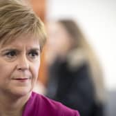 Nicola Sturgeon and Boris Johnson need to work to win approval for next phase of lockdown from opposition parties (Picture: Jane Barlow/pool/AFP via Getty Images)