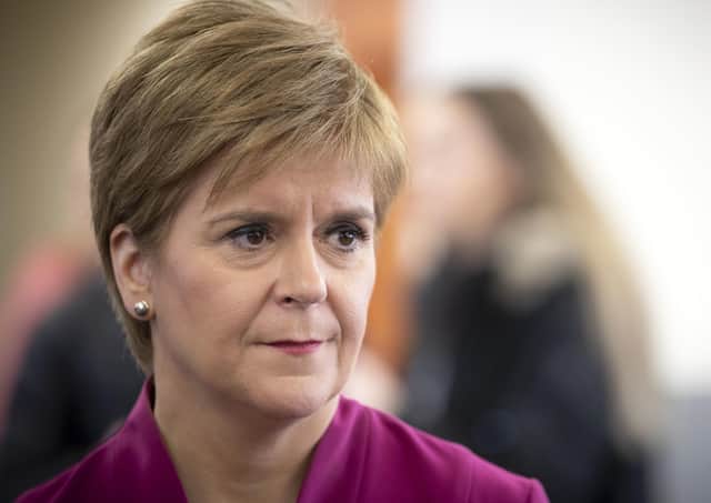 Nicola Sturgeon and Boris Johnson need to work to win approval for next phase of lockdown from opposition parties (Picture: Jane Barlow/pool/AFP via Getty Images)