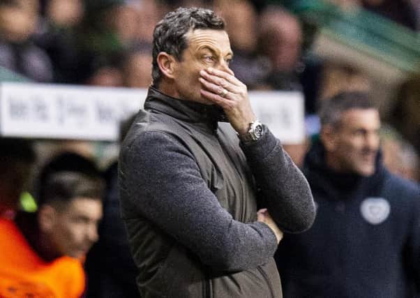 Jack Ross watches on during his side's derby defeat by Hearts. Picture: Ross Parker/SNS