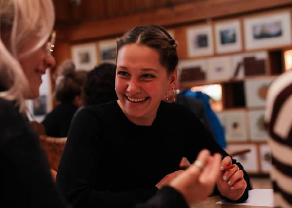 Lily Asch. Performance Storyteller, Facilitator and Founder of Real Talk CIC