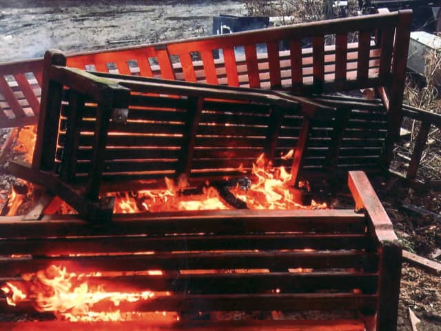 Memorial benches from Edinburgh's Princes Street Gardens are burned at a facility on the outskirts of the city