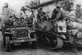 Dwight Eisenhower is driven in a jeep to visit the Italian war front. Picture: Getty
