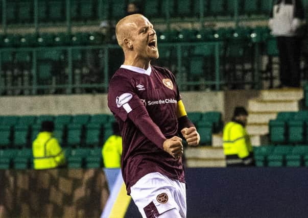 Steven Naismith enjoys Hearts' derby win over Hibs. Picture: Ross Parker / SNS
