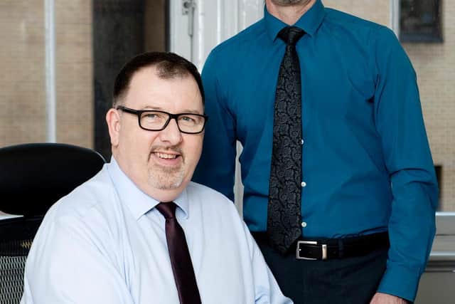 Ian Wright and Quantuma corporate restructuring and insolvency partner Scott Milne. Picture: Andy Buchanan