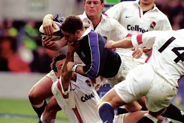 Alan Tait's superb try against England in the 1999 Five Nations is rarely shown on TV because the game was broadcast by Sky. Picture: David Rogers /Allsport