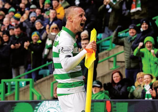 Leigh Griffiths celebrates his first goal for Celtic against St Mirren. Picture: Ross Parker/ SNS