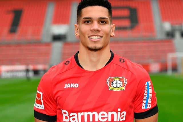 Brazilian teenager Paulinho scored twice in Leverkusen's win over Eintracht Frankfurt.