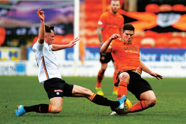 Dundee United's Dillon Powers, right, was on target against Partick Thistle. Picture: Ross MacDonald / SNS