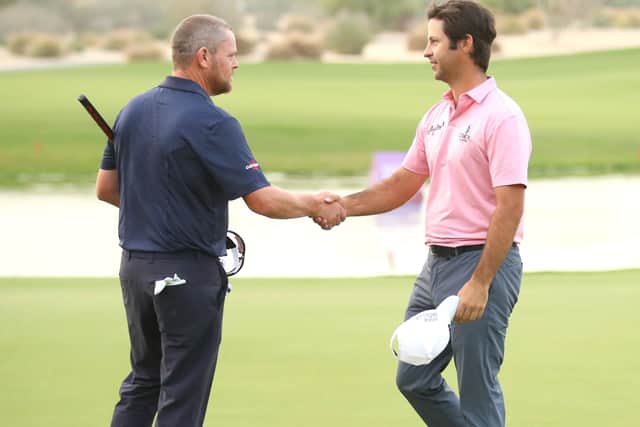 David Drysdale, left, congratulates Jorge Campillo at the end of their play-off in the Qatar Masters. Picture: Warren Little/Getty