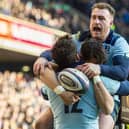 Scotland captain Stuart Hogg celebrates Sean Maitland's first try in the win over France. Picture: Ross Parker/SNS/SRU