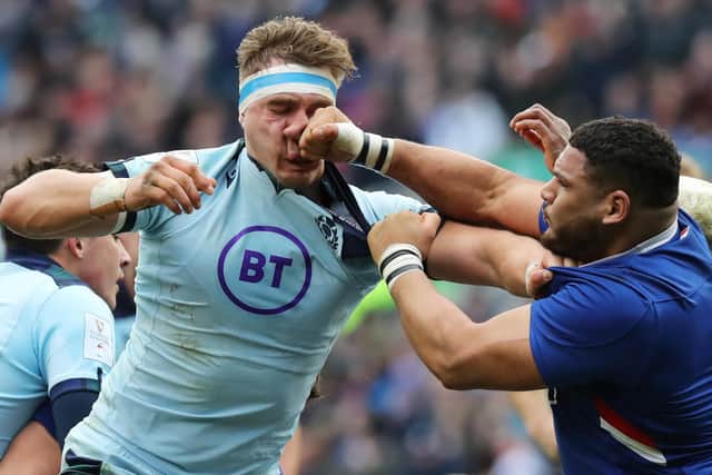 Mohamed Haouas of France punches Scotland's Jamie Ritchie at BT Murrayfield. Picture: David Rogers/Getty Images