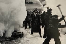 Merchant Navy crews who left Loch Ewe in the Highlands smash ice off their vessel as it heads up through the Arctic Circle to Russia during World War Two. PIC: Contributed.