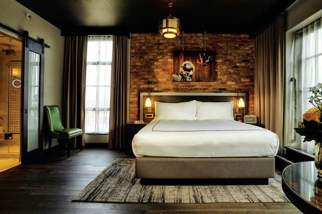 One of the hote's 120 rooms and suites, designed to give guests a taste of New York warehouse living