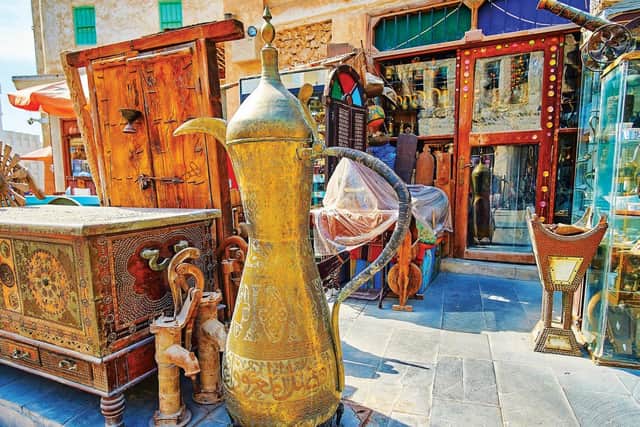 Souq Waqif has lane upon lane of shops selling souvenirs, and is good for gold and gourmet discoveries