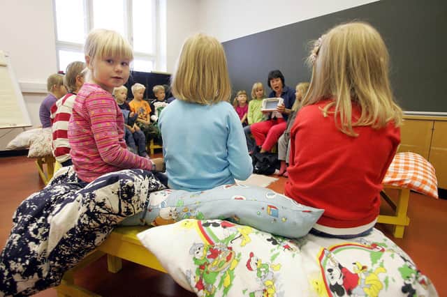 Children listen to their teacher at a school in Vaasa, Finland (Picture: Olivier Morin/AFP/Getty)