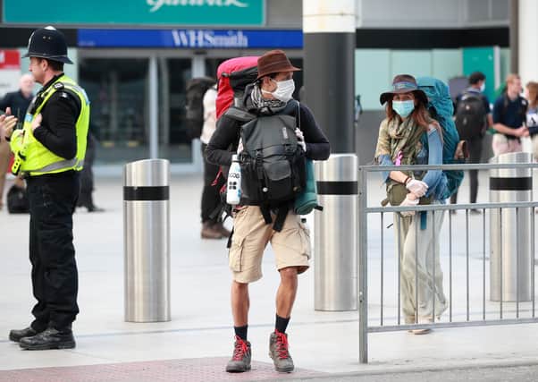 Passengers arrive at Gatwick airport after a repatriation flight from Peru but the UK Government must do more (Picture: Adam Davy/PA Wire)