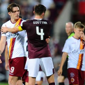 Stenhousemuir and Hearts players embrace after the League 2 side met the Premiership outfit in a Betfred Cup tie at Tynecastle last July. Picture Michael Gillen.